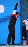 Charles Hamelin receives his gold medal in men's 1500 metre short track