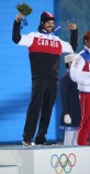 Charles Hamelin receives his gold medal in men's 1500 metre short track