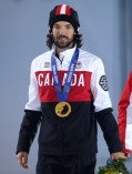 Charles Hamelin receives his gold medal in men's 1500 metre short track