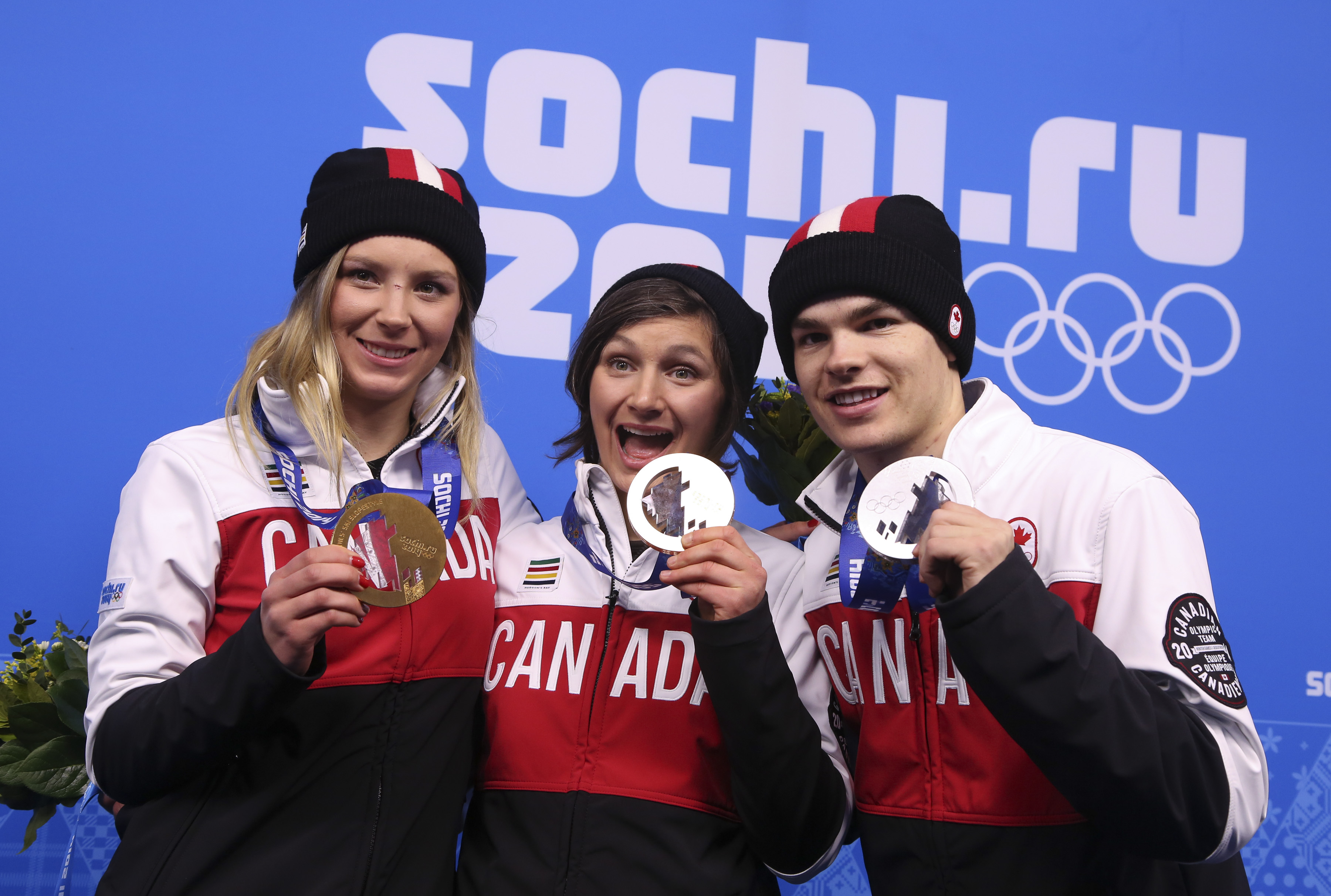 Dara Howell and Kim Lamarre with Mikaël Kingsbury
