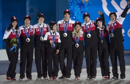 Team Canada posing for a picture with their medals