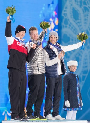 Mike Riddle poses with the other medallists