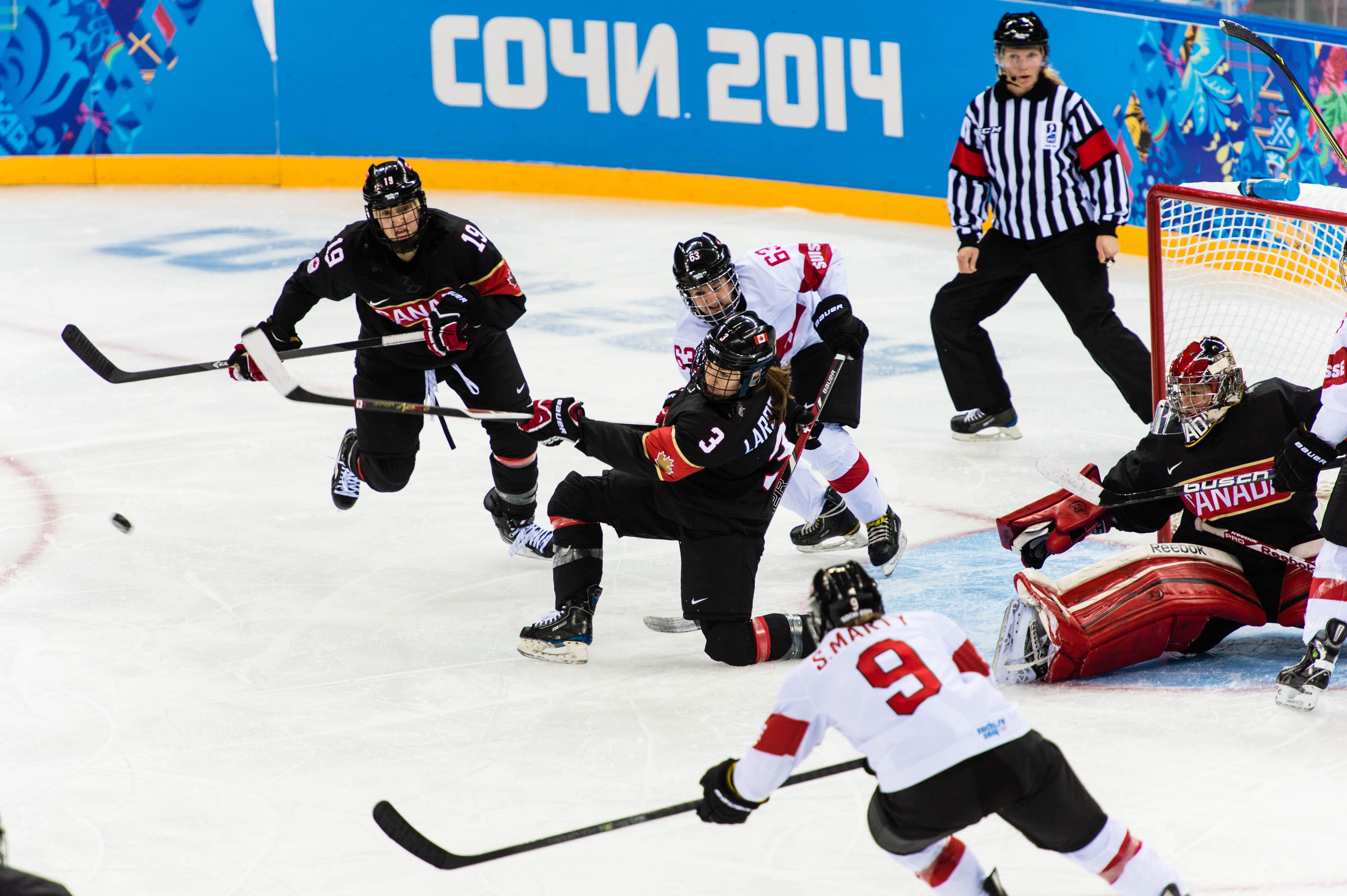Jocelyn Laroque (3) clears a puck out of the Canada zone