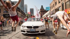 Olympic partner BMW Canada provided vehicles for the parade convoy but national team tumblers had their own ideas for travel.