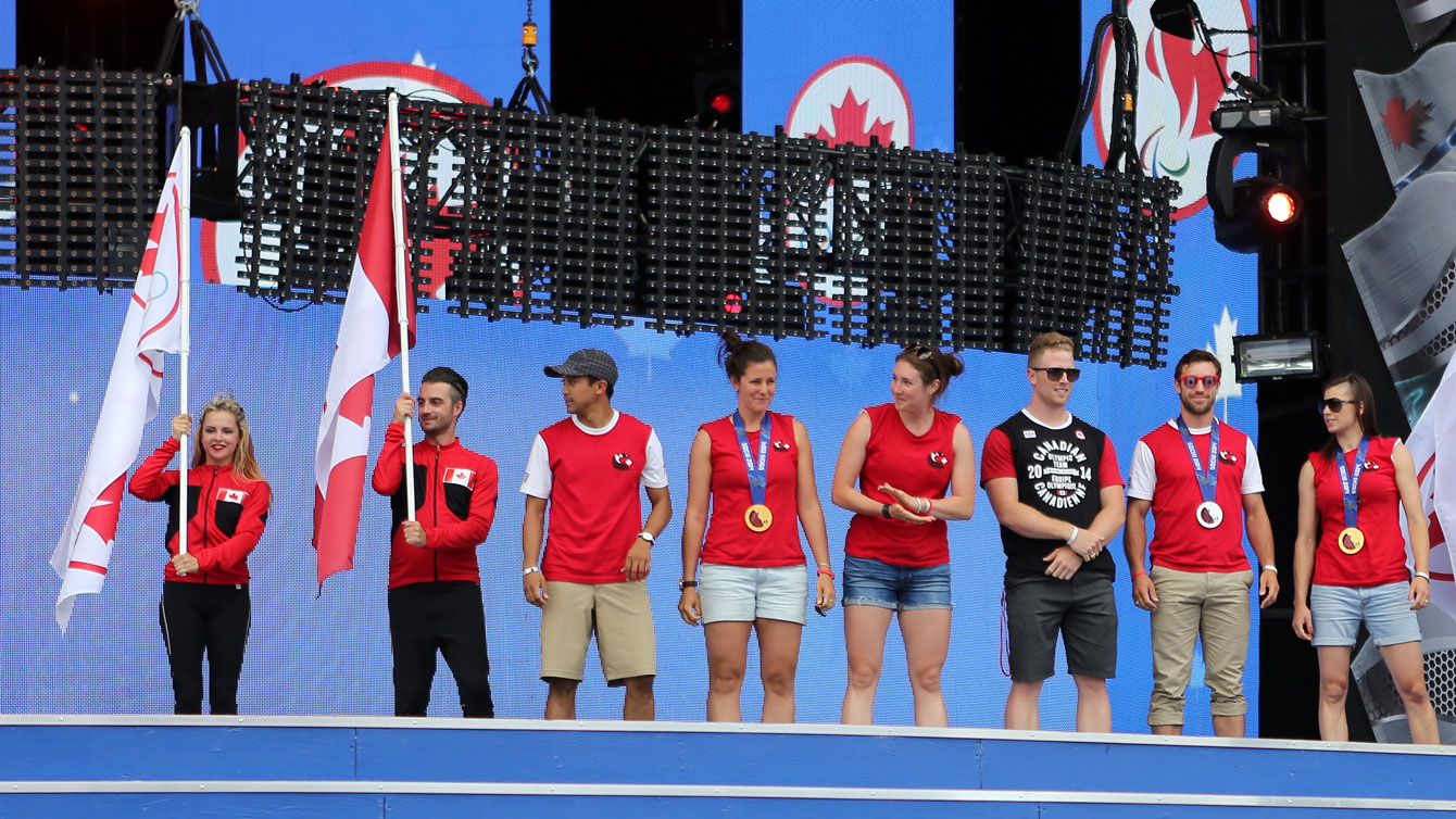Olympians and Paralympians representing Canada at Sochi were introduced on stage.
