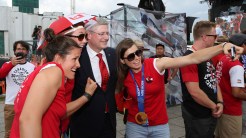 Lacasse opts for the selfie with Prime Minister Stephen Harper.