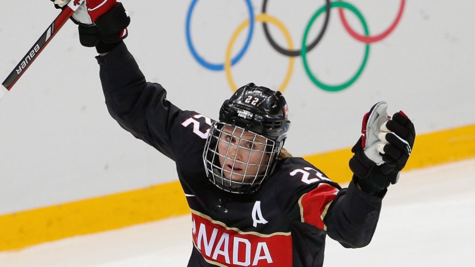 Hayley Wickenheiser Hayley Wickenheiser raises her arms in celebration