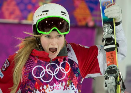 Justine Dufour-Lapointe celebrates her gold medal in women's moguls