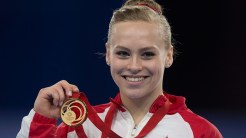 Elsabeth "Ellie" Black is emerging as an elite gymnast, she won three medals at Glasgow, one of each colour.