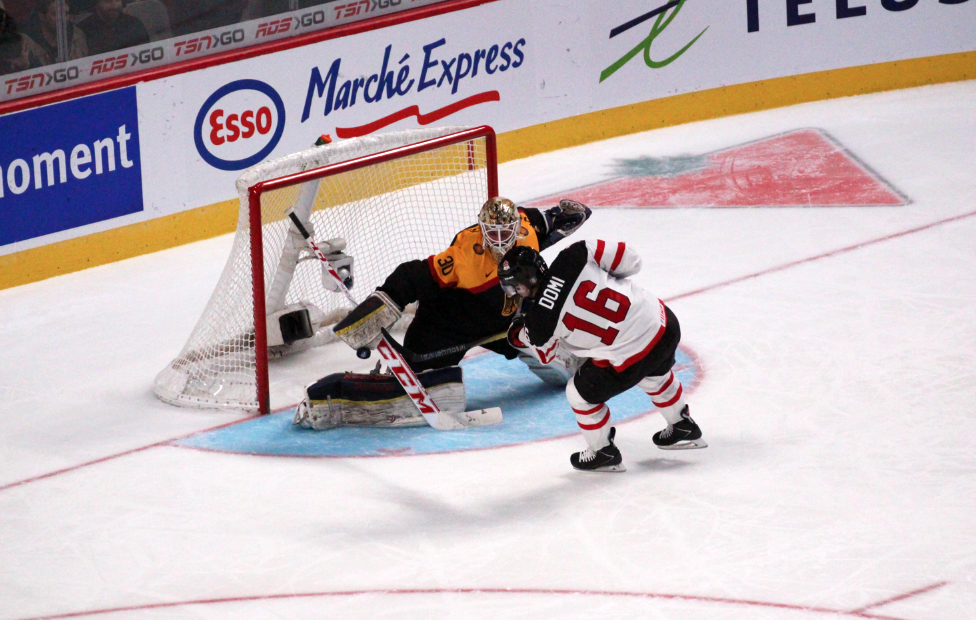 Canada's Max Domi is stopped by German goalie Kevin Reich on a breakaway. Domi did get the better of Reich with a third period goal. 