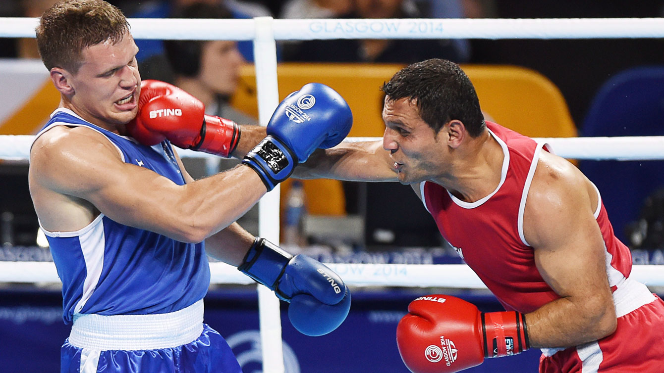 Samir El Mais (right, in red) won boxing gold in Glasgow 2014 and firmly set his sights on Rio 2016.