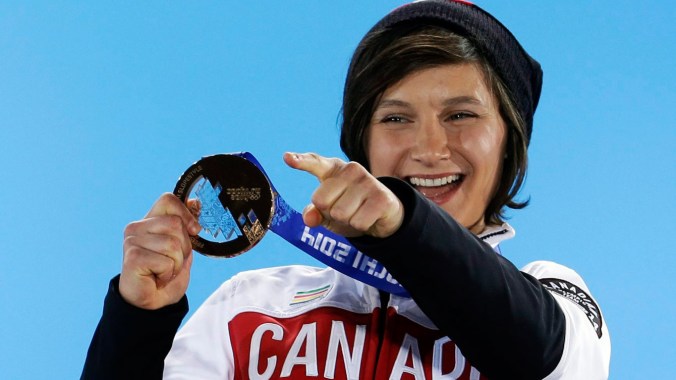 Kim Lamarre receives her bronze medal at the presentation ceremony.