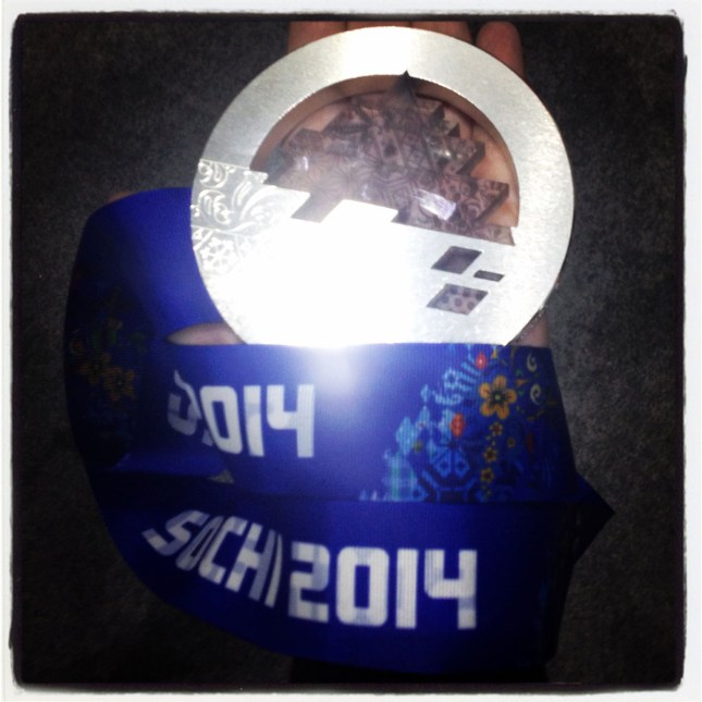 Olympic.ca researcher Paula Nichols holds Denny Morrison's Sochi silver medal.