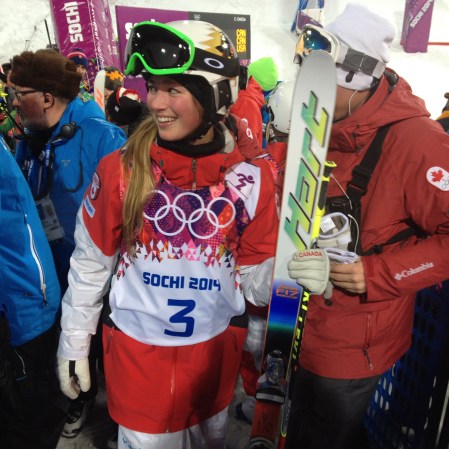 Silver medalist Chloé Dufour-Lapointe makes her way through the crowd moments after stepping down from the women's moguls podium in Sochi. Photo: Steve Boudreau