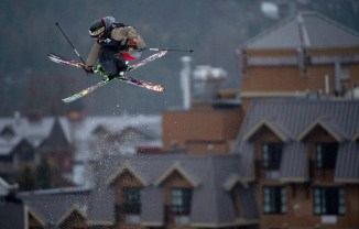 Alex Bellemare sticks a grab during a big air competition. (Photo: Canadian Press)