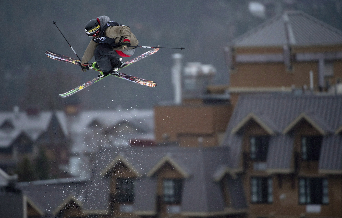 Alex Bellemare sticks a grab during a big air competition. (Photo: Canadian Press)