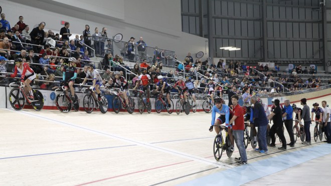 Cyclicsts line up for the men's omnium points race at the Milton Velodrome Pan Am Test Event. 