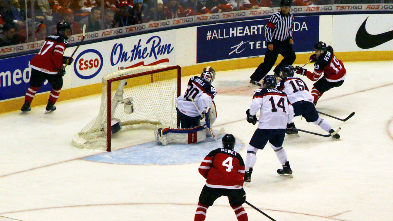 Nic Petan scores the opening goal of the semifinal against Slovakia, his first of three on the night. 