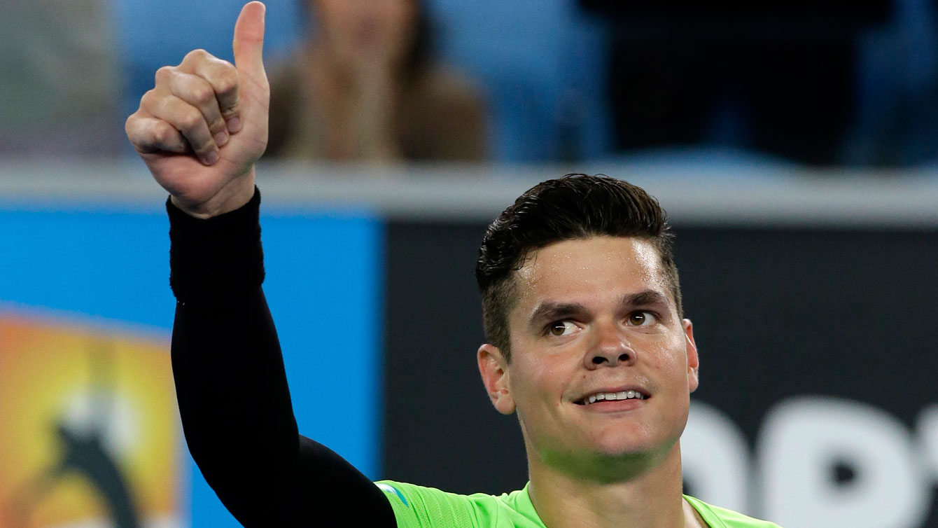Milos Raonic gives a thumbs up after winning a match at the 2015 Australian Open. 