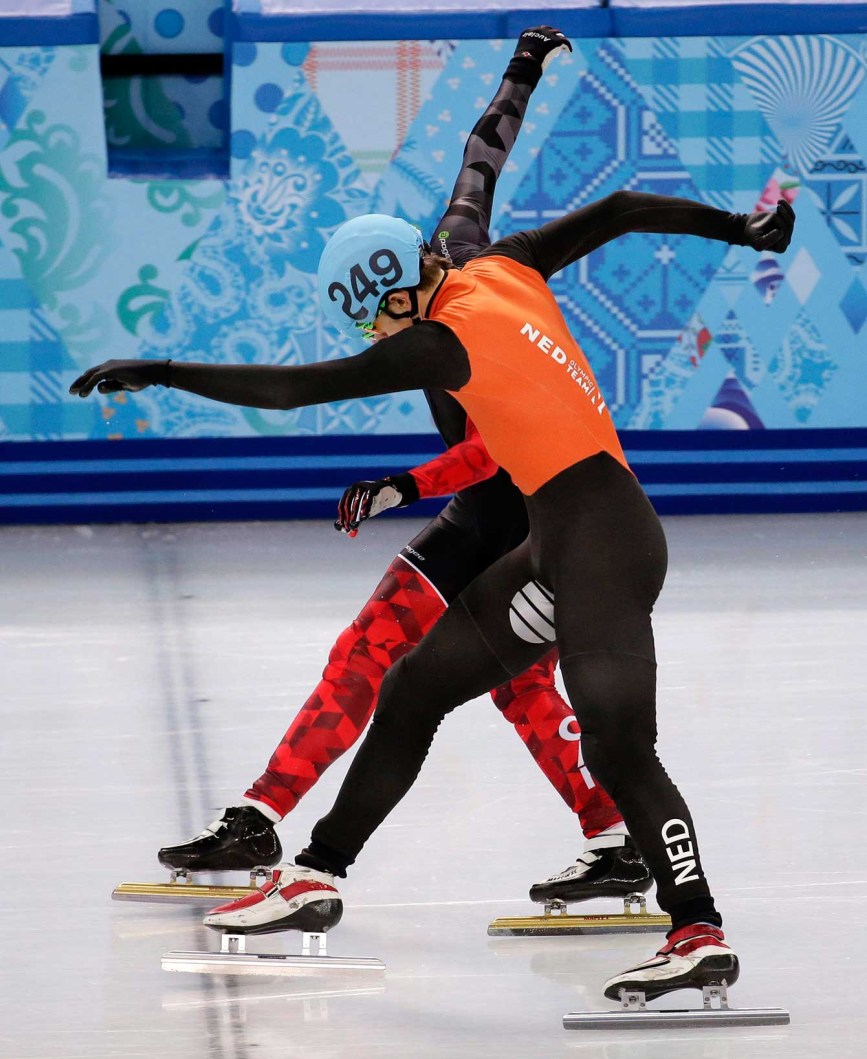 Charle Cournoyer (R) won the 500m bronze medal in short track.