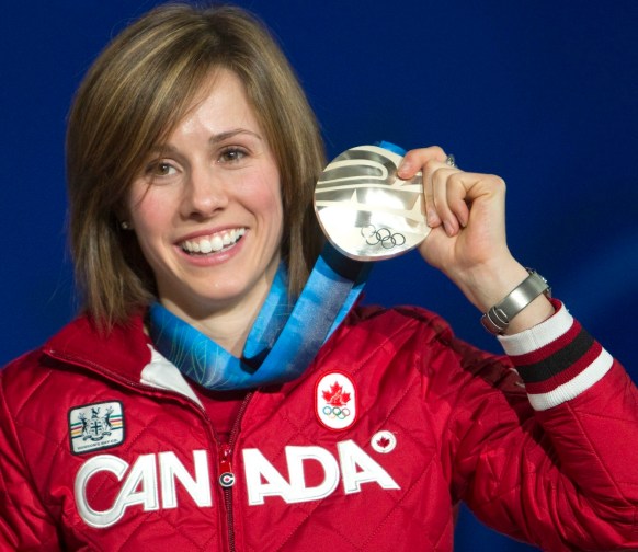 Jennifer Heil; Hannah Kearney; Shannon Bahrke; Canada's Jennifer Heil celebrates her silver medal for ladies moguls in freestyle skiing Sunday Feb. 14, 2010 at the Vancouver 2010 Olympic Winter Games. THE CANADIAN PRESS/Ryan Remiorz