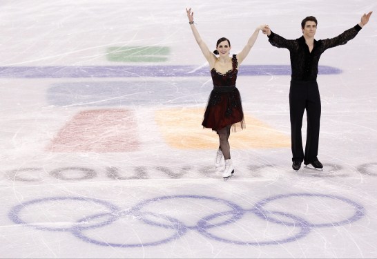 Tessa Virtue Scott Moir Canada's Tessa Virtue and Scott Moir salute the crowd following their compulsory dance in the ice dance competition Friday February 19, 2010 at the 2010 Vancouver Olympic Winter Games in Vancouver. THE CANADIAN PRESS/Paul Chiasson