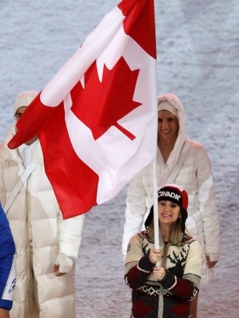 Joannie Rochette Women's figure skating bronze medallist Joannie Rochette carries the Canadian flag into the Vancouver 2010 Olympic Winter Games closing ceremony on Sunday, Feb. 28, 2010 at B.C. Place in Vancouver. THE CANADIAN PRESS/Nathan Denette