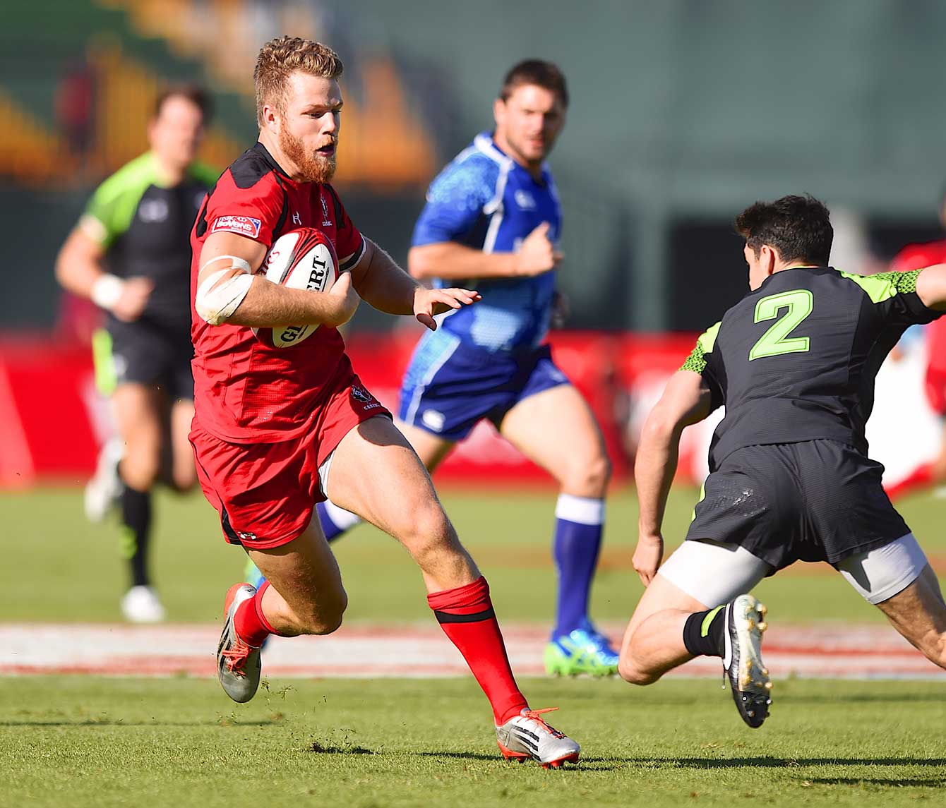 Canada's Conor Trainor carries the ball in sevens action. Photo: Ian Muir / Rugby Canada