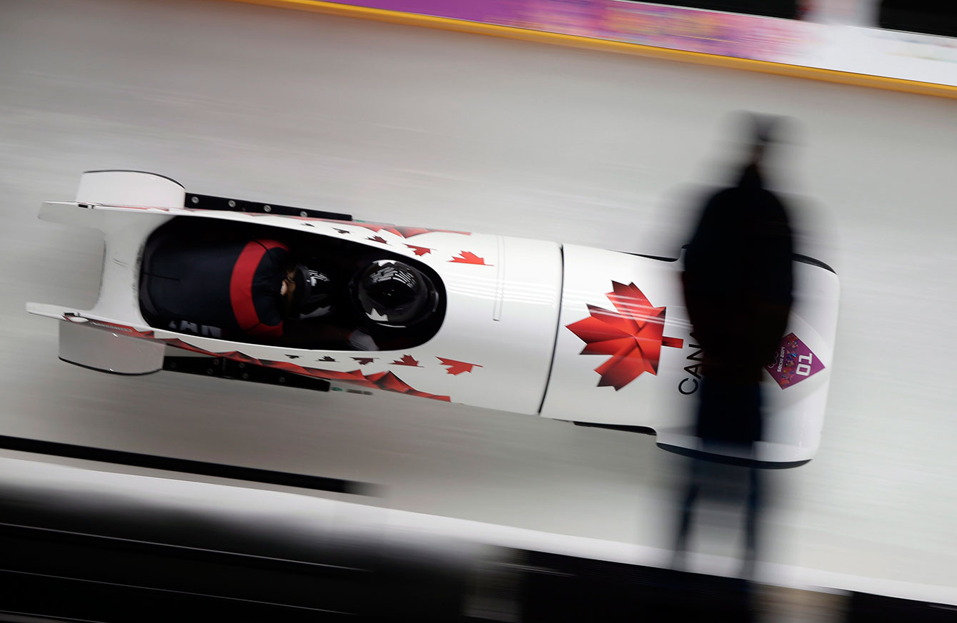 Kaillie Humphries and Heather Moyse during bobsleigh competition in Sochi.