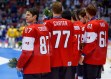 Men's ice hockey team captain Sidney Crosby looks around during the medal ceremony.