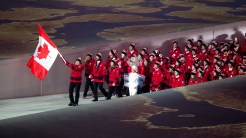 Hayley Wickenheiser led Canada out at Fisht Olympic Stadium during the Parade of Athletes.