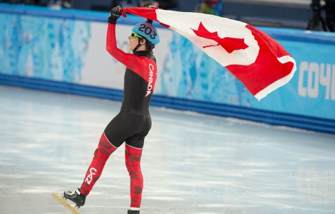 Charle Cournoyer (R) won the 500m bronze medal in short track.