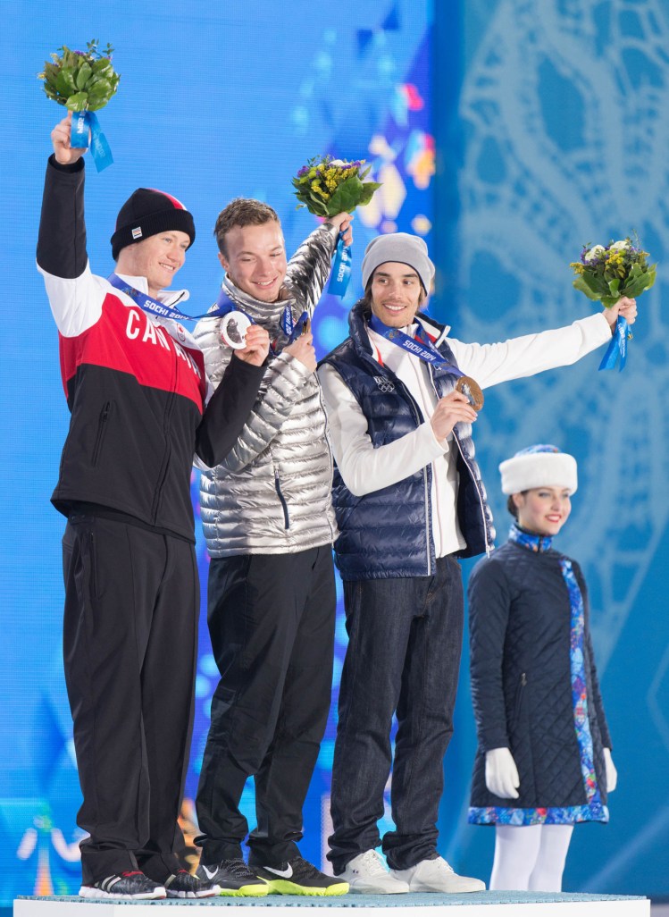 Mike Riddle (left) at the official medal ceremony.