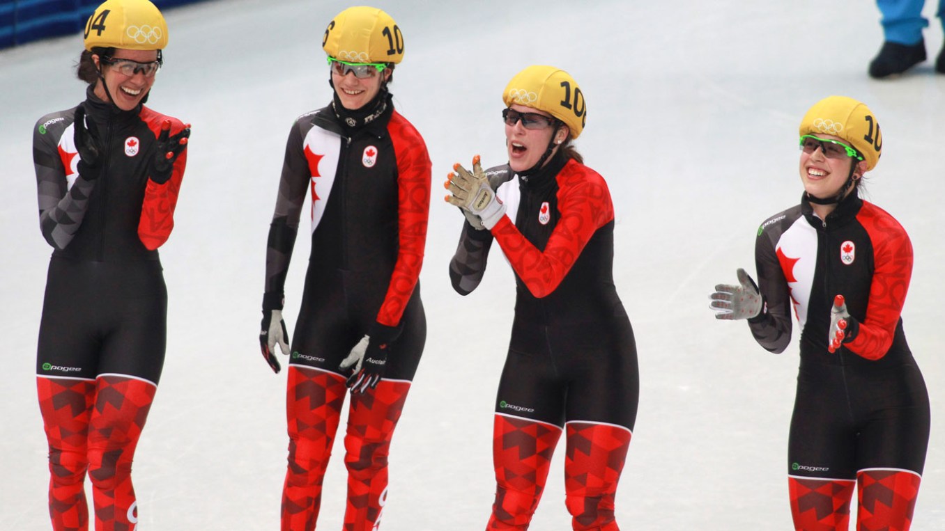 (L-R) Marie-Ève Drolet, Jessica Hewitt, Marianne St-Gelais, Valérie Maltais celebrate after learning they won a silver medal in the women's 300m relay.