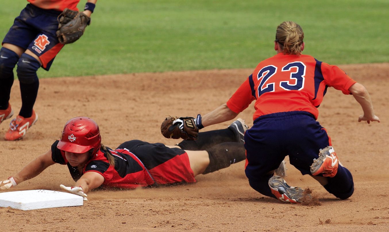 Joey Lye slides head first into second base