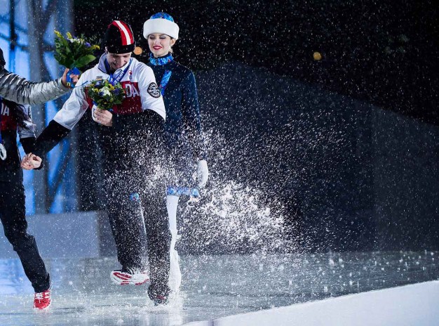 Tessa Virtue and Scott Moir at the victory ceremony for ice dance in Sochi.