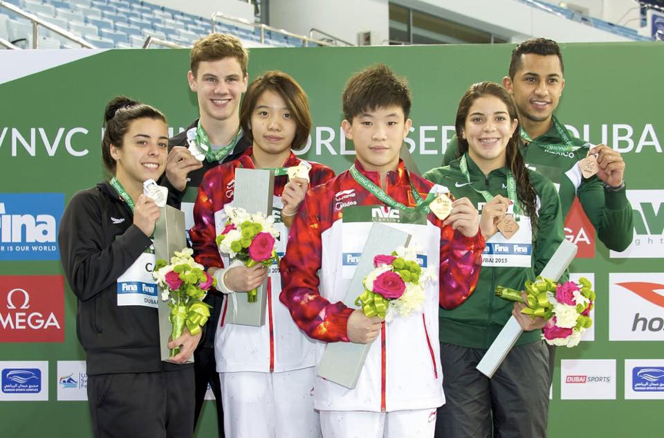(First two from the left) Meaghan Benfeito and Vincent Riendeau at the medal ceremony on final day in Dubai. Photo via FINA Diving World Series - Dubai on Facebook.