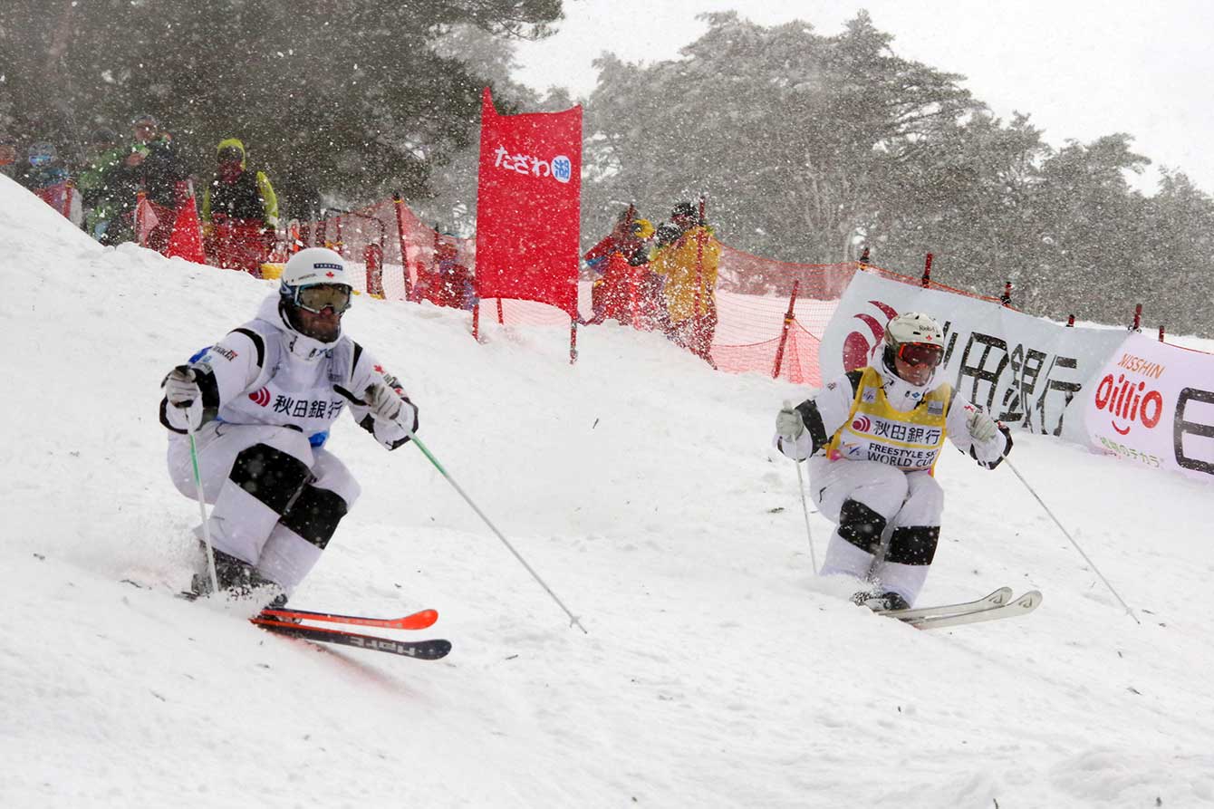 Mikaël Kingsbury (R) and Philippe Marquis during the dual moguls final in Tazawako, Japan.