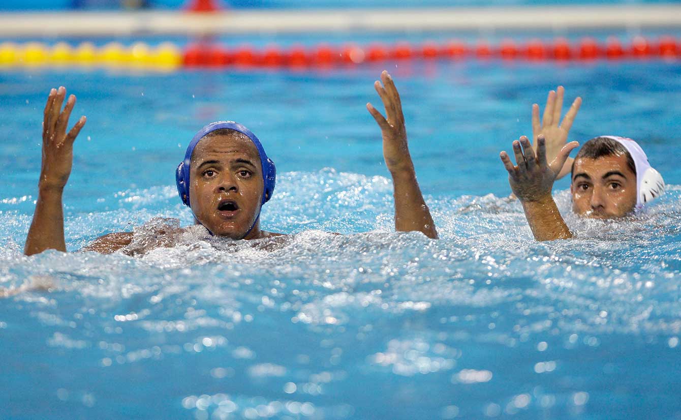 Nathaniel Miller tries to sell a call during a game at the Beijing 2008 Olympic Games. 