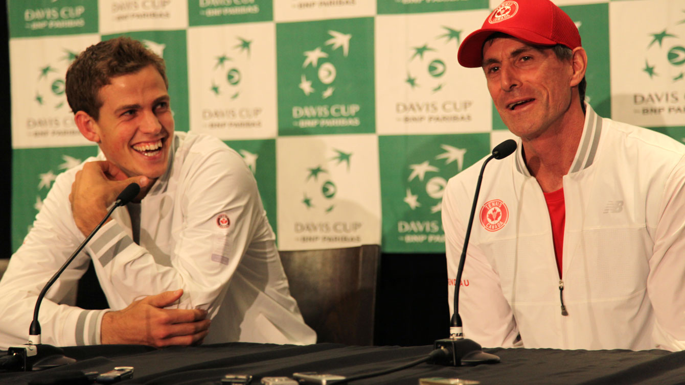 Vasek Pospisil (left) with team captain Martin Laurendeau following the conclusion of the Japan Davis Cup tie in Vancouver.