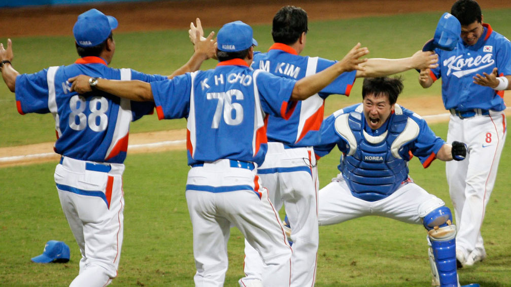 South Korea, the last Olympic baseball champions, celebrate at Beijing 2008.