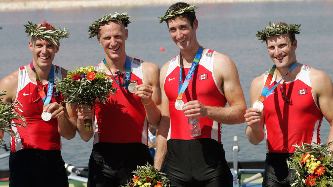 Barney Williams (left) with Jake Wetzel, Thomas Herschmiller and Cameron Baerg, receiving their rowing silver medals at Athens 2004.