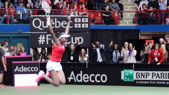 Francoise Abanda celebrates as she beats Irina-Camelia Begu of Romania in Fed Cup on April 18, 2015.
