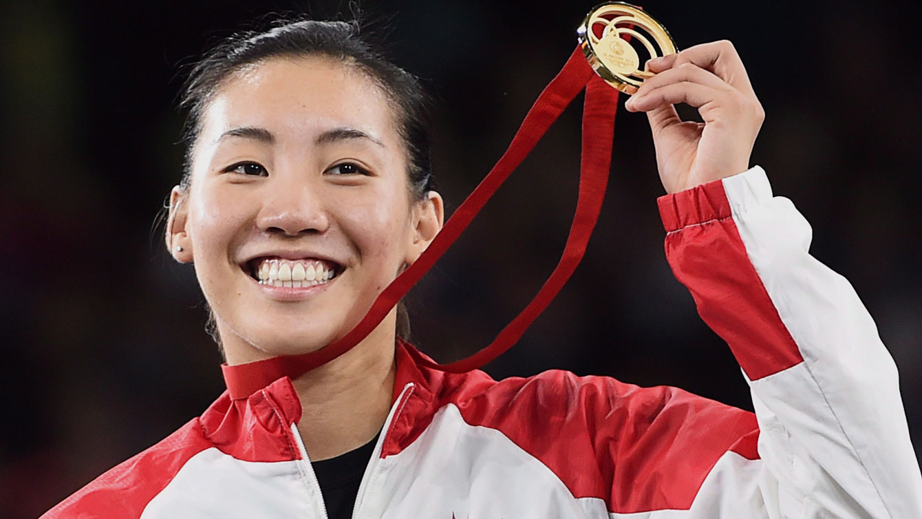 Michelle Li with her Glasgow 2014 Commonwealth Games gold medal on August 3, 2014. 