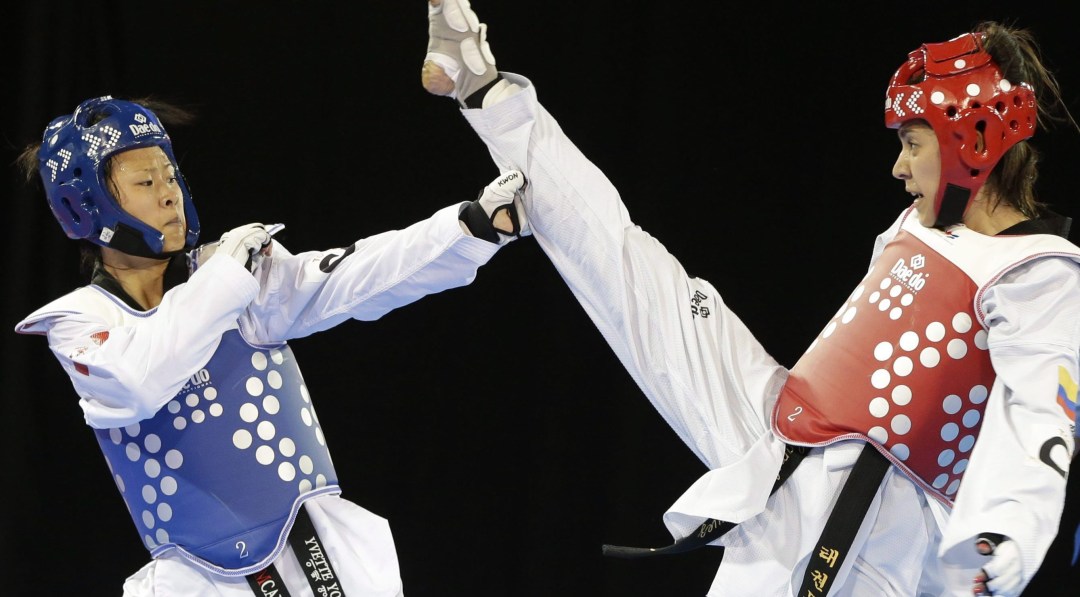 Canada's Yvette Yong fights Colombia's Ibeth Rodriguez during a women's -49kg quarterfinal taekwondo match at the Pan Am Games in 2015