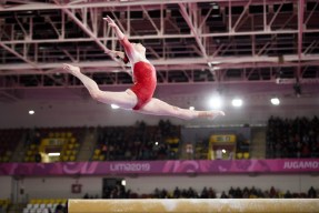 Isabela Onyshko of Canada competes in the balance beam