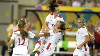 Fleming celebrates with teammates