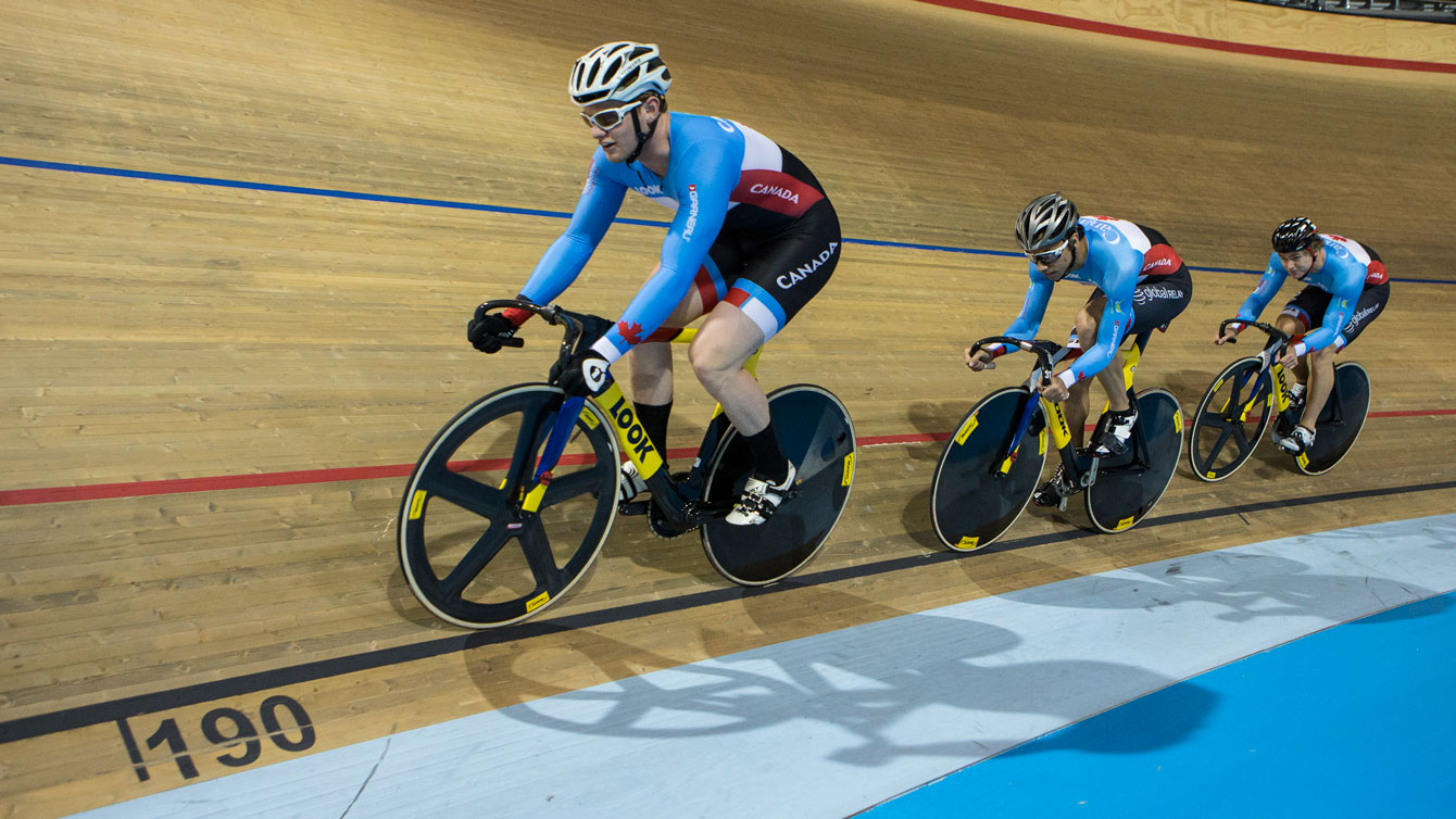 Men's sprint competitors Evan Carey, Joseph Veloce and Hugo Barrette do a demonstration at the Pan Am team announcement on June 1, 2015.