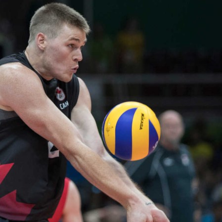 team-canada-gord-perrin-volleyball Canada's Gord Perrin bumps the ball