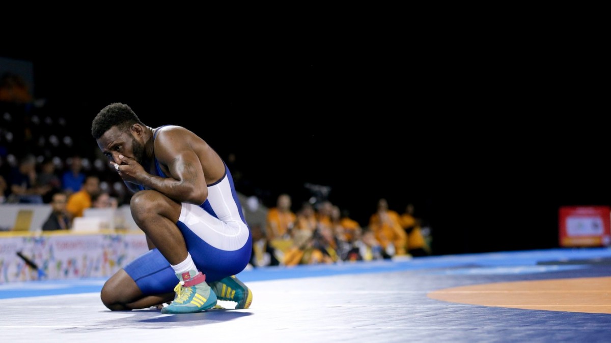 Canada's Haislan Garcia reacts to losing in the men's freestyle 65 kg
